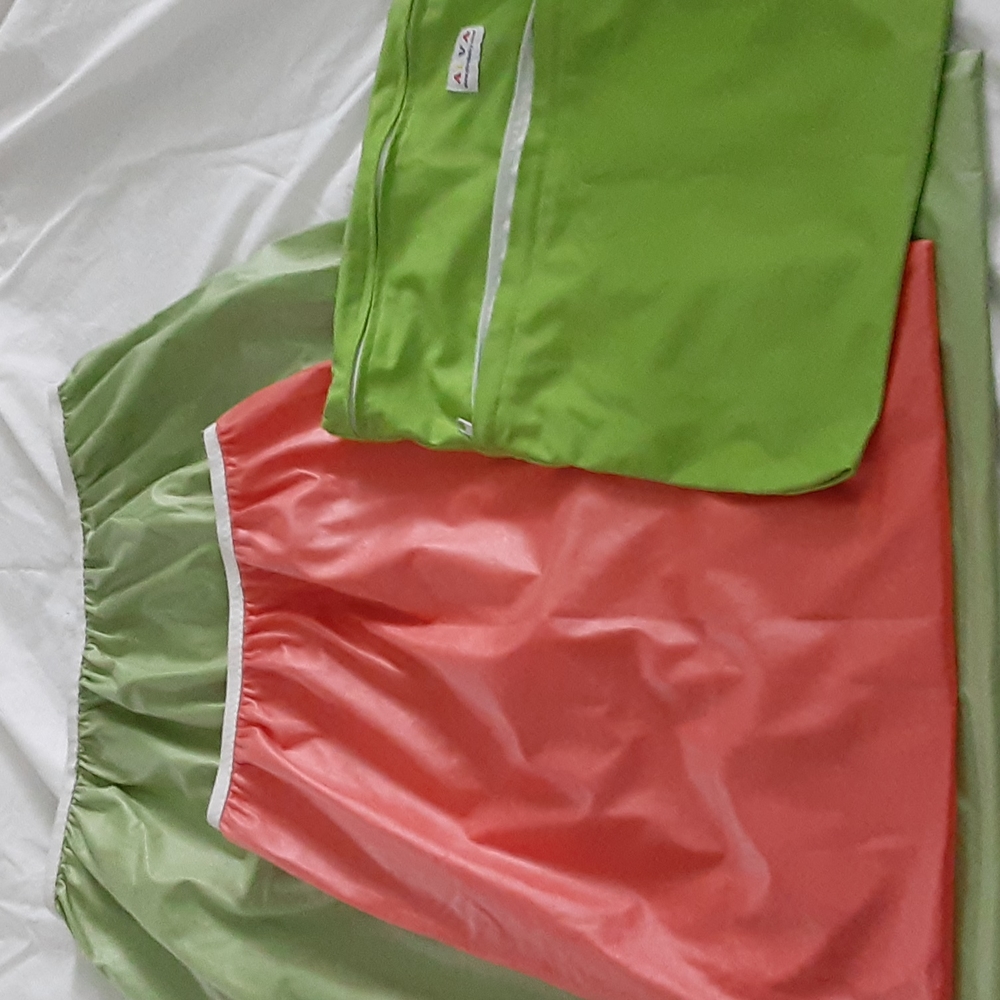 Cloth diaper liners and travel diaper sack